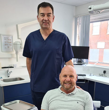 patient Iain Cotterill after affordable dental implants near me by Dr Ahmed